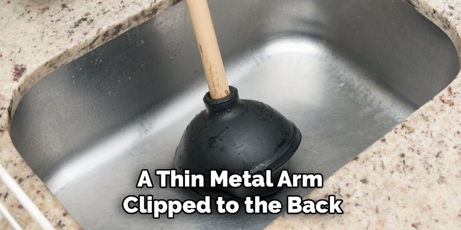 A Thin Metal Arm 
Clipped to the Back