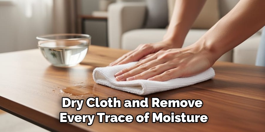 Dry Cloth and Remove 
Every Trace of Moisture