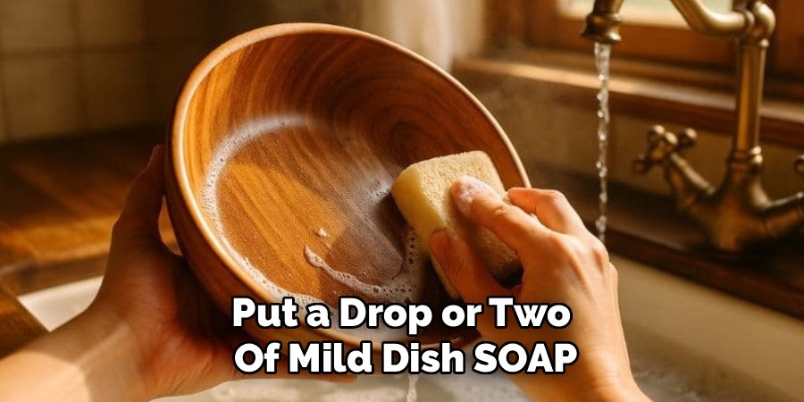 Put a Drop or Two 
Of Mild Dish SOAP