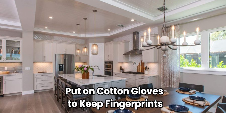 Put on Cotton Gloves 
to Keep Fingerprints