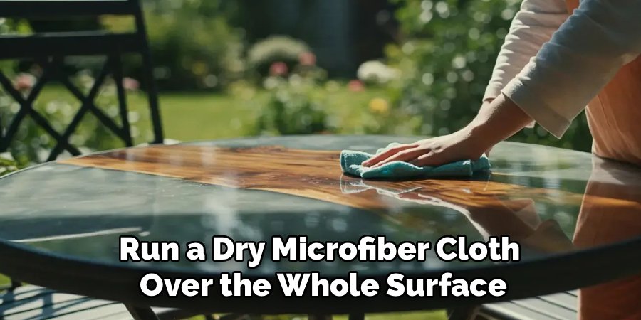 Run a Dry Microfiber Cloth 
Over the Whole Surface