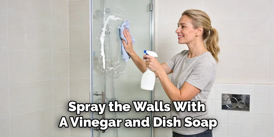 Spray the Walls With 
A Vinegar and Dish Soap