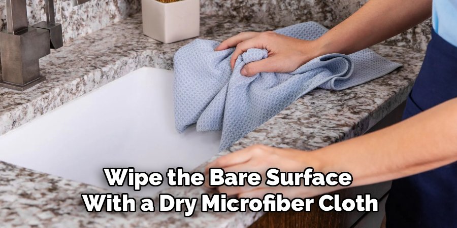 Wipe the Bare Surface 
With a Dry Microfiber Cloth