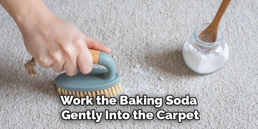 Work the Baking Soda 
Gently Into the Carpet