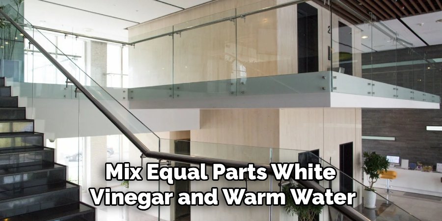 Mix Equal Parts White 
Vinegar and Warm Water