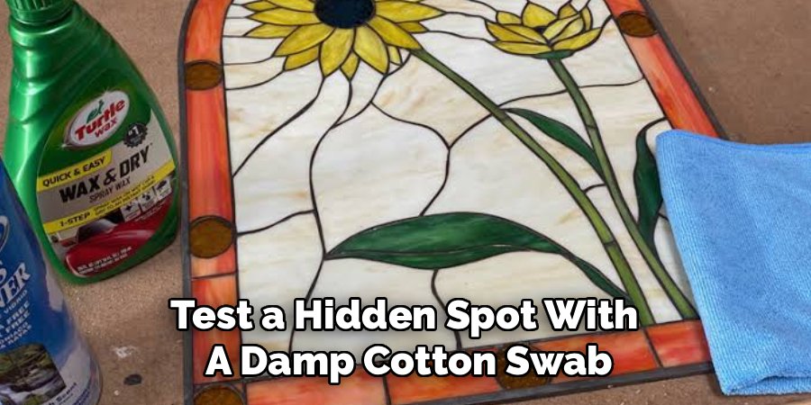 Test a Hidden Spot With 
A Damp Cotton Swab